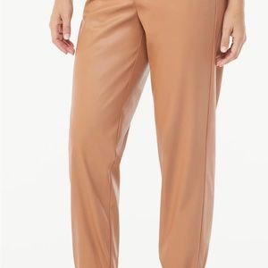 Sofia Vergara leather like camel joggers.